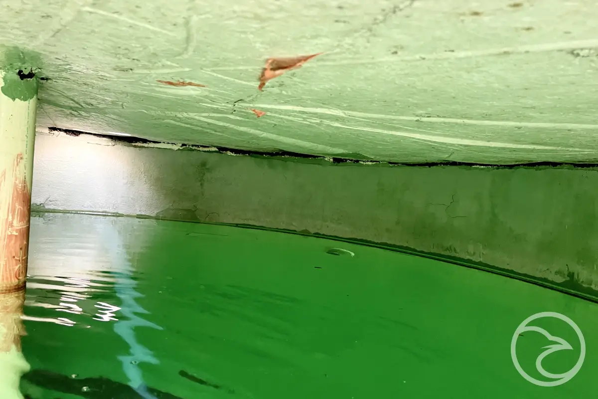 Internal corrosion caused by poor water quality in industrial tanks