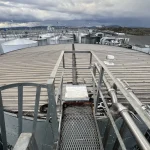 Technician performing detailed tank roof inspection in Sydney