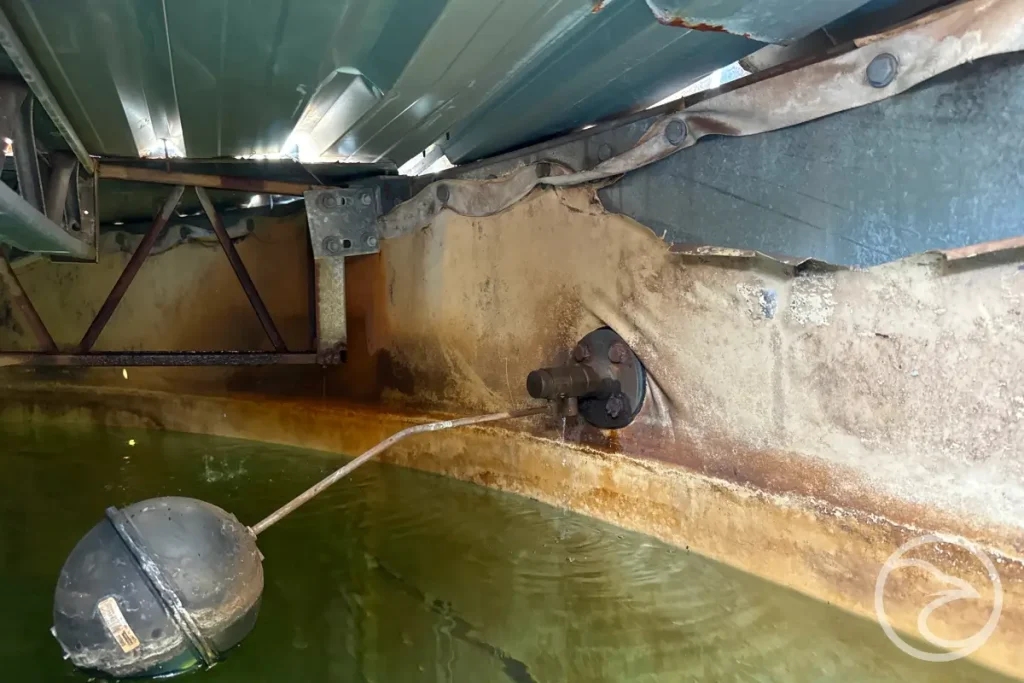 industrial storage tank showing material wear