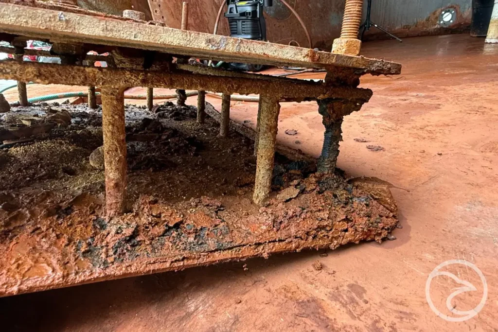 rust damage in storage tank requiring repair